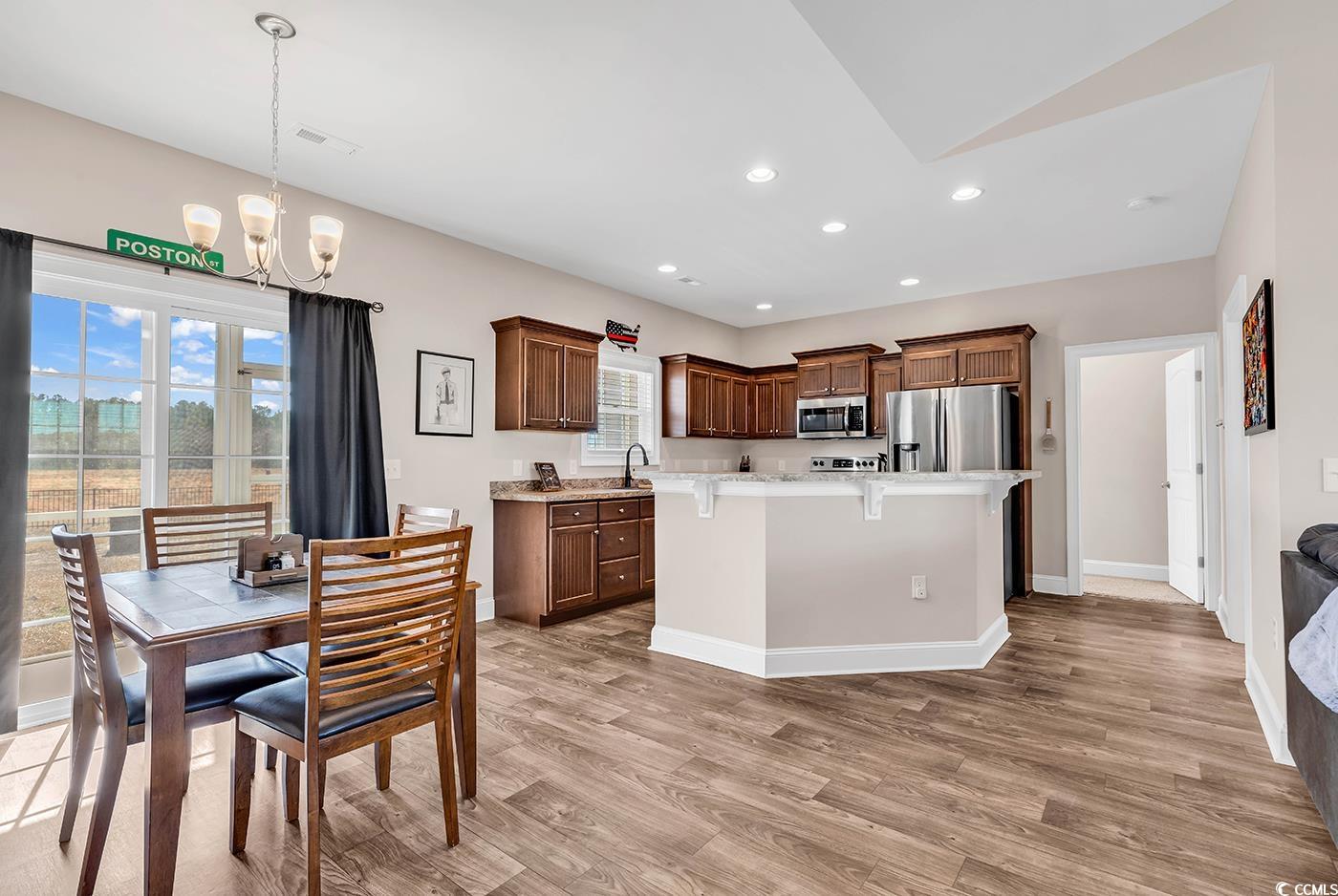 3604 Pasture Road Aynor, SC 29511 - Photo 8 of 27 Kitchen featuring a breakfast bar, appliances with