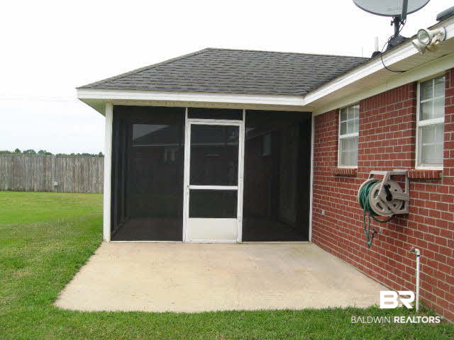 8973 Sherman Road Foley, AL 36535 - Photo 4 of 4 screened in back porch
