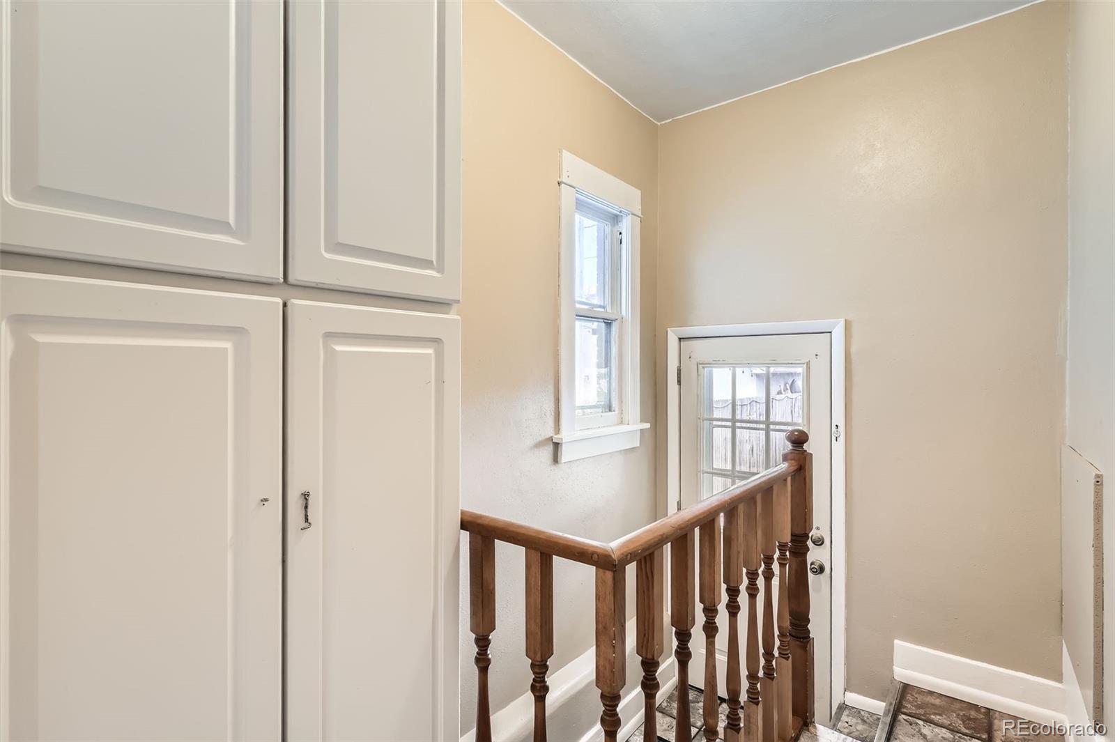 827 South Sherman Street Denver, CO 80209 - Photo 20 of 27 a view of entryway with wooden floor