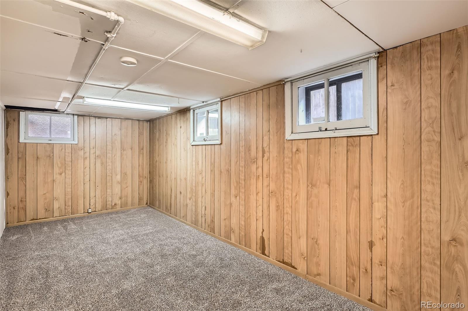 827 South Sherman Street Denver, CO 80209 - Photo 22 of 27 a view of an empty room with windows
