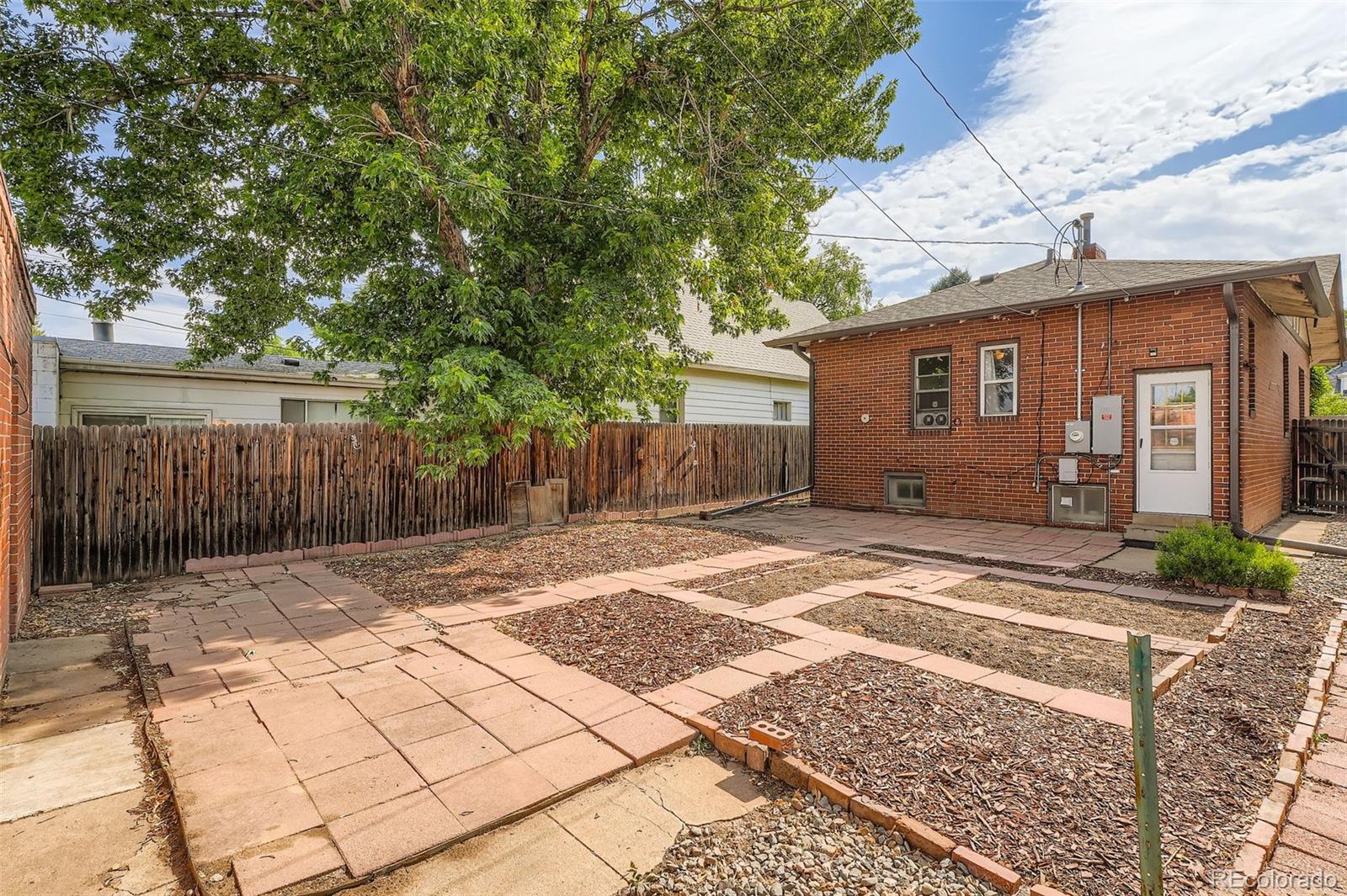 827 South Sherman Street Denver, CO 80209 - Photo 27 of 27 a view of a backyard with wooden fence