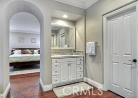 22 Sanctuary Irvine, CA 92620 - Photo 12 of 45 a en suite bathroom with a double vanity sink and a mirror