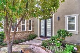 22 Sanctuary Irvine, CA 92620 - Photo 21 of 45 front view of a house with a tree