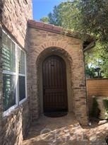 22 Sanctuary Irvine, CA 92620 - Photo 25 of 45 a front view of a house with a yard