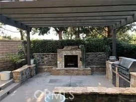 a view of a chairs and table in the patio