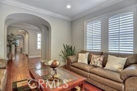 22 Sanctuary Irvine, CA 92620 - Photo 5 of 45 a living room with furniture and wooden floor