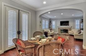 22 Sanctuary Irvine, CA 92620 - Photo 8 of 45 a living room with furniture fireplace and a flat screen tv