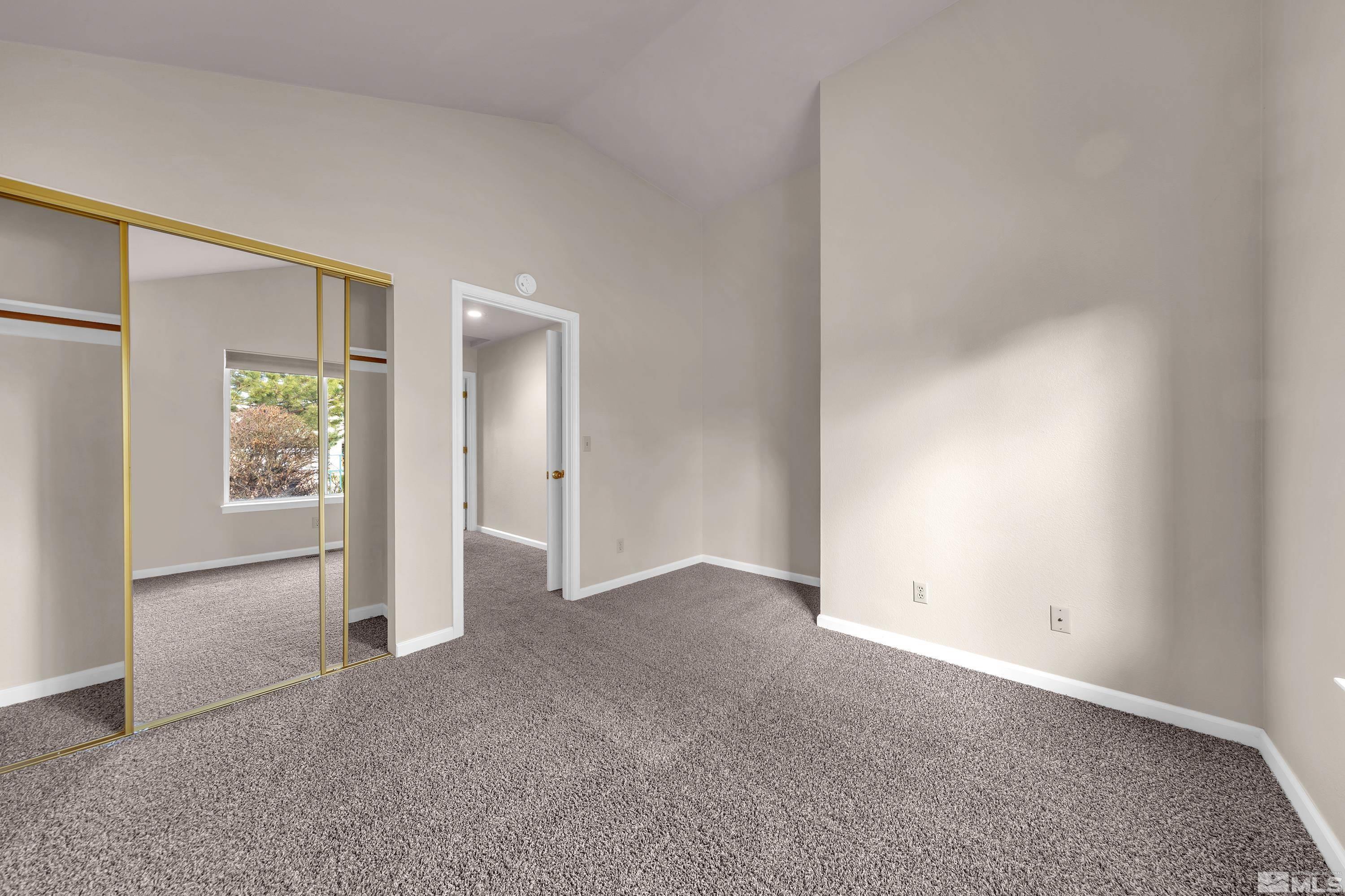 3308 Current Court Reno, NV 89509 - Photo 4 of 39 an empty room with windows and closet