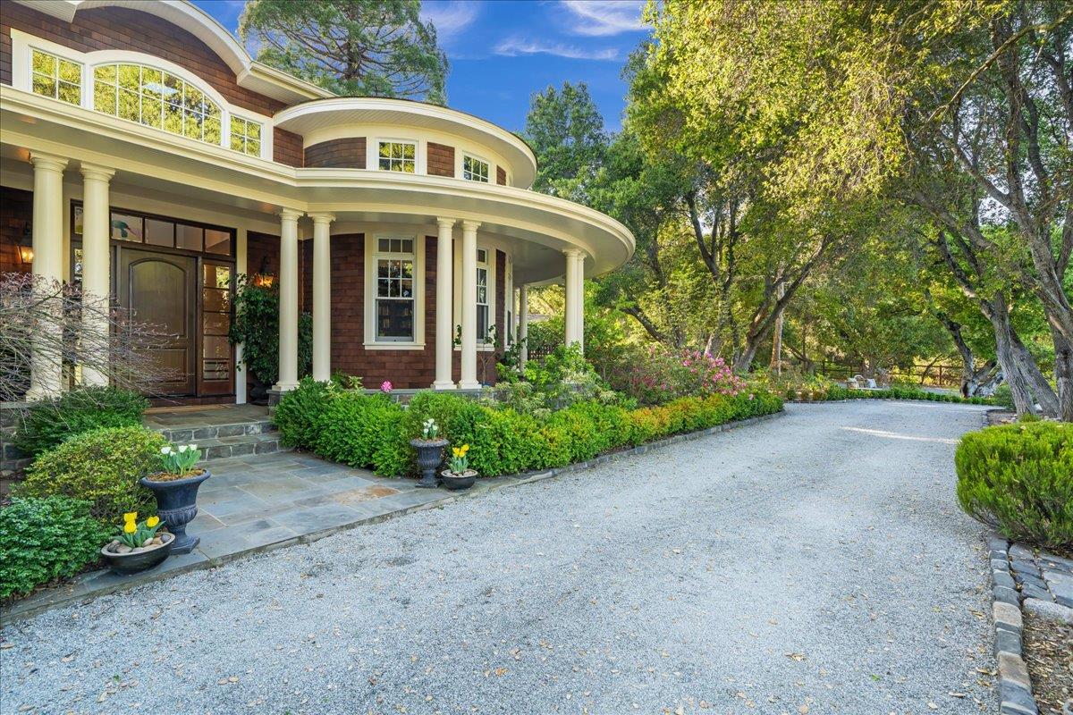 3510 Alpine Road Portola Valley, CA 94028 - Photo 7 of 77 a front view of a building with garden