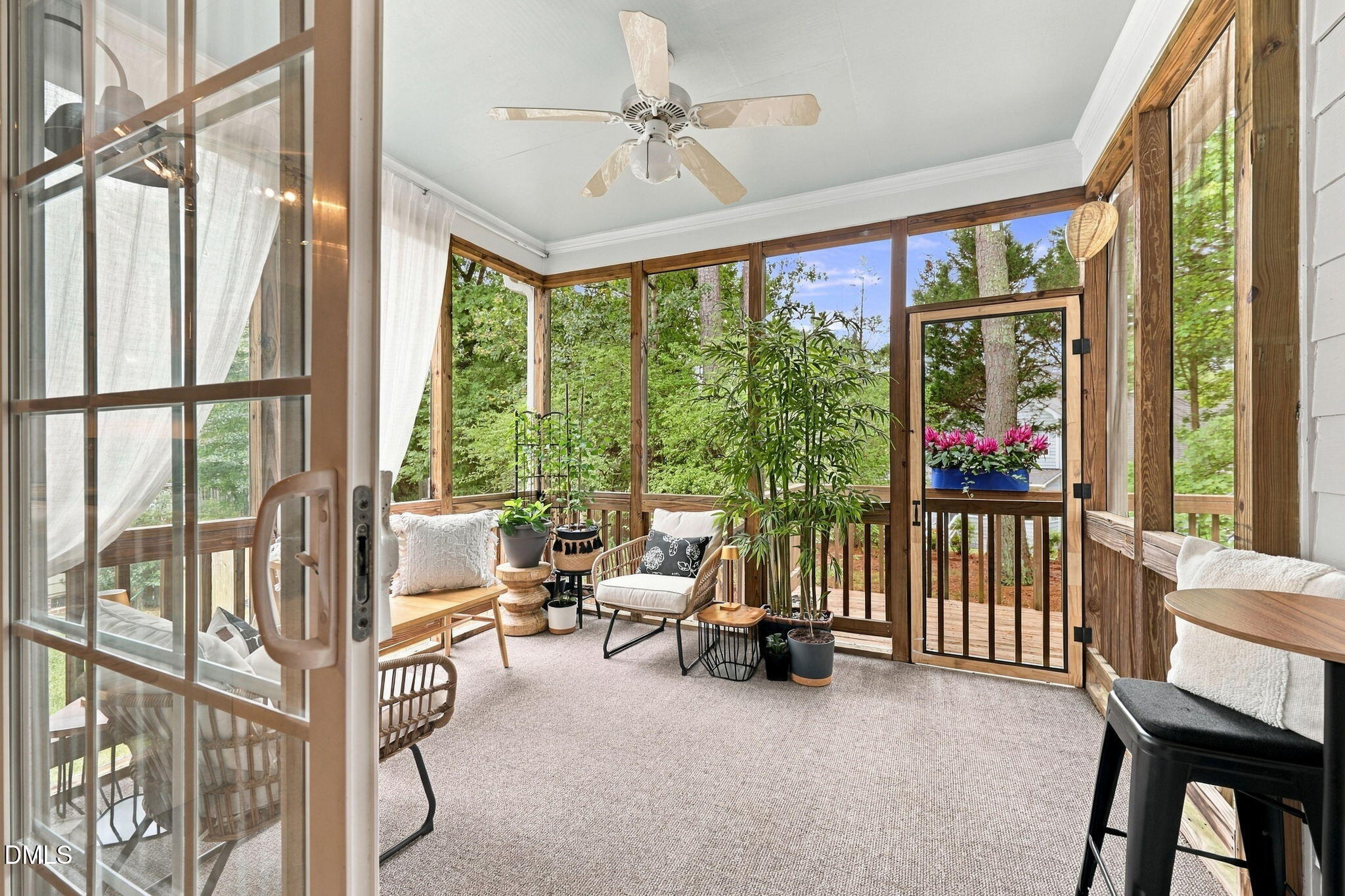 6 Sydenham Road Durham, NC 27713 - Photo 17 of 44 Screened porch featuring a ceiling fan, sliding glass door, and wood-finish walls
