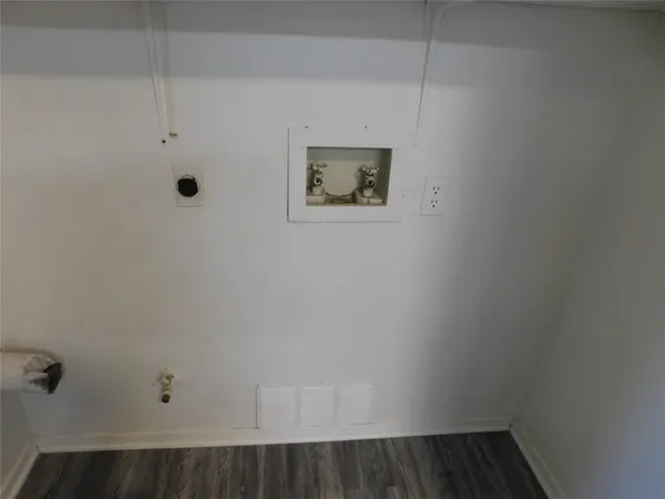 a view of a room with rack on the wall