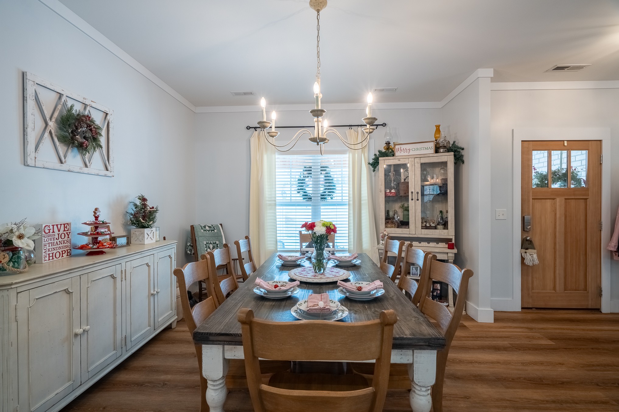 54 Spring Drive Killen, AL 35645 - Photo 15 of 75 a view of a dining room with furniture and chandelier