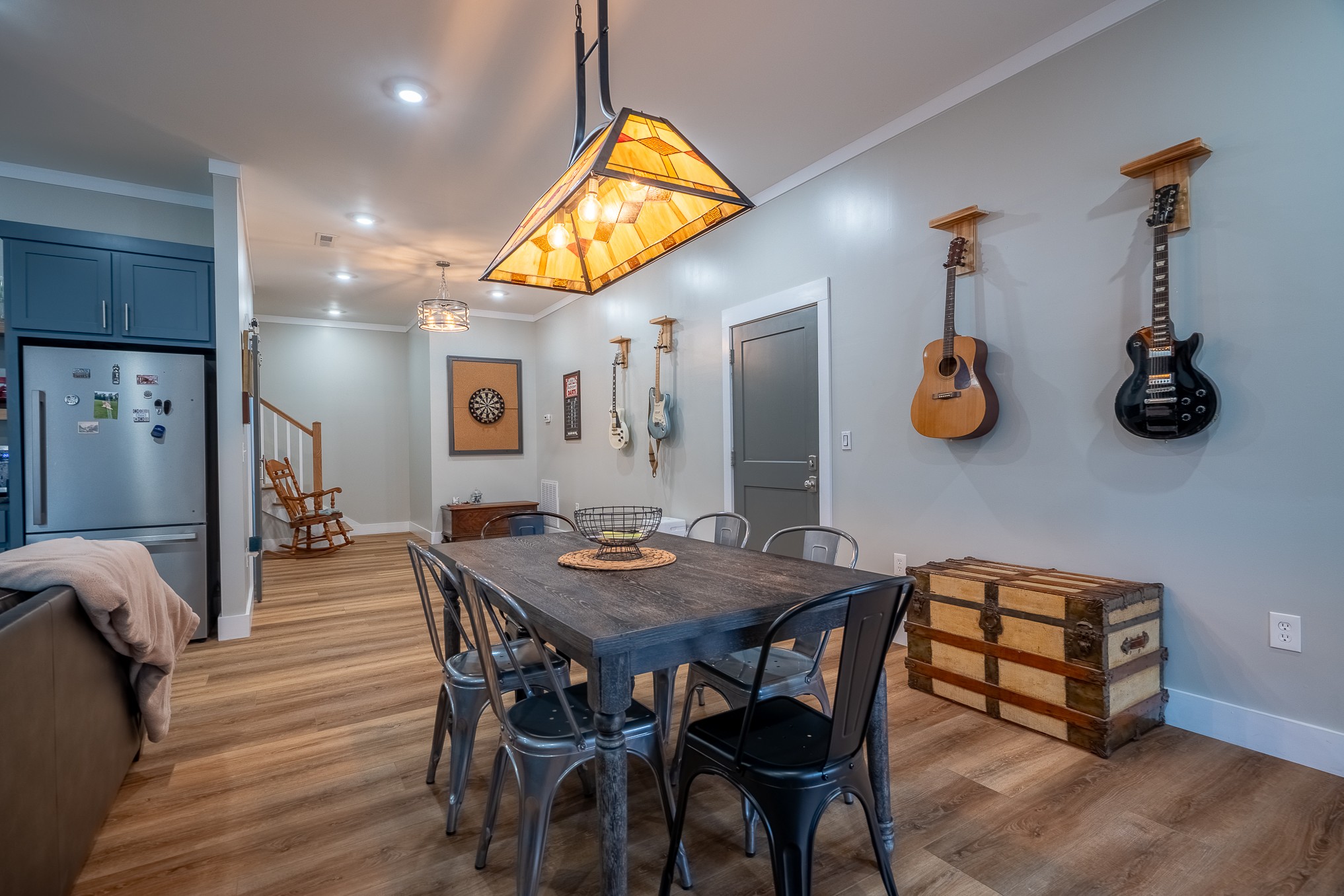 54 Spring Drive Killen, AL 35645 - Photo 58 of 75 a dining room with stainless steel appliances kitchen island a table and chairs