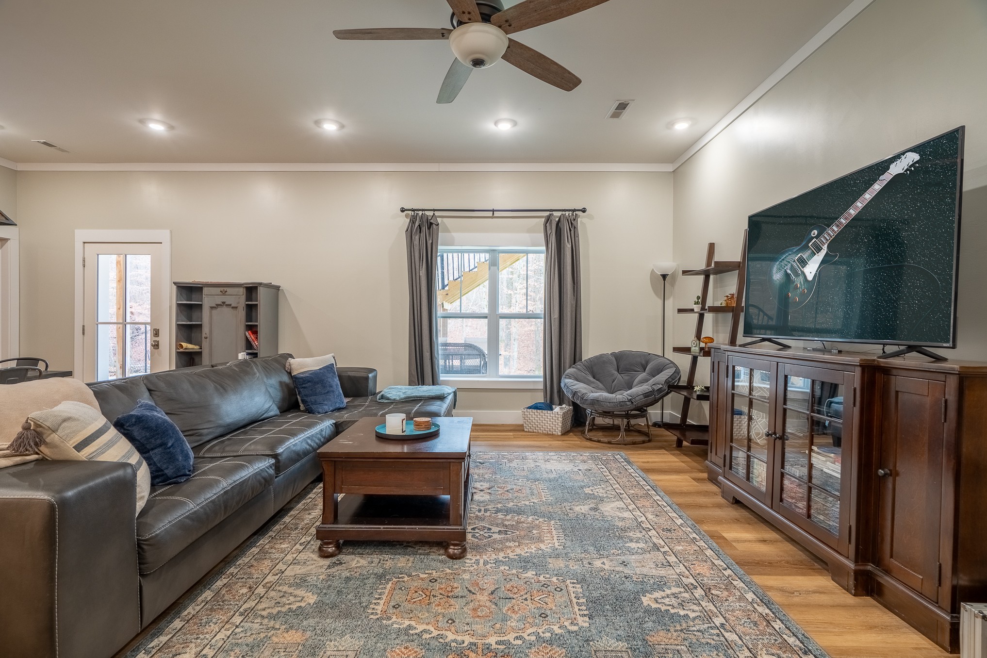 54 Spring Drive Killen, AL 35645 - Photo 61 of 75 a living room with furniture and a flat screen tv