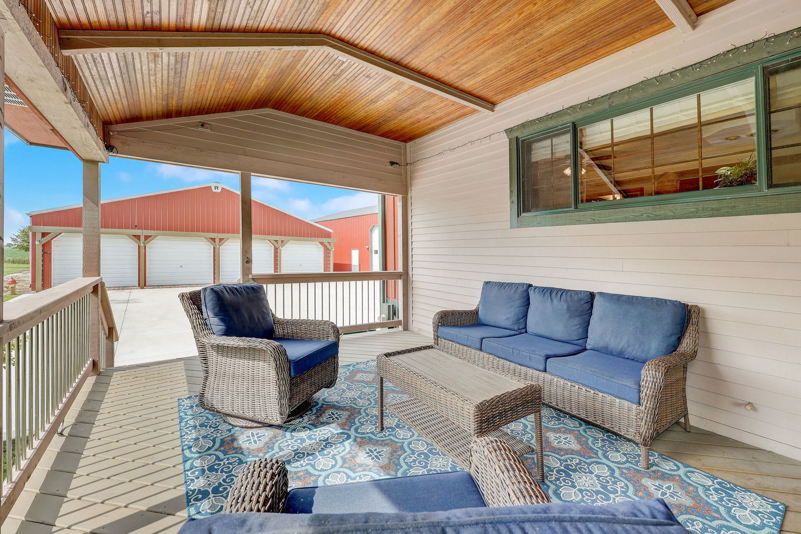 4234 East 12000th Road North Peotone, IL 60468 - Photo 11 of 62 a outdoor living space with patio furniture and wooden floor