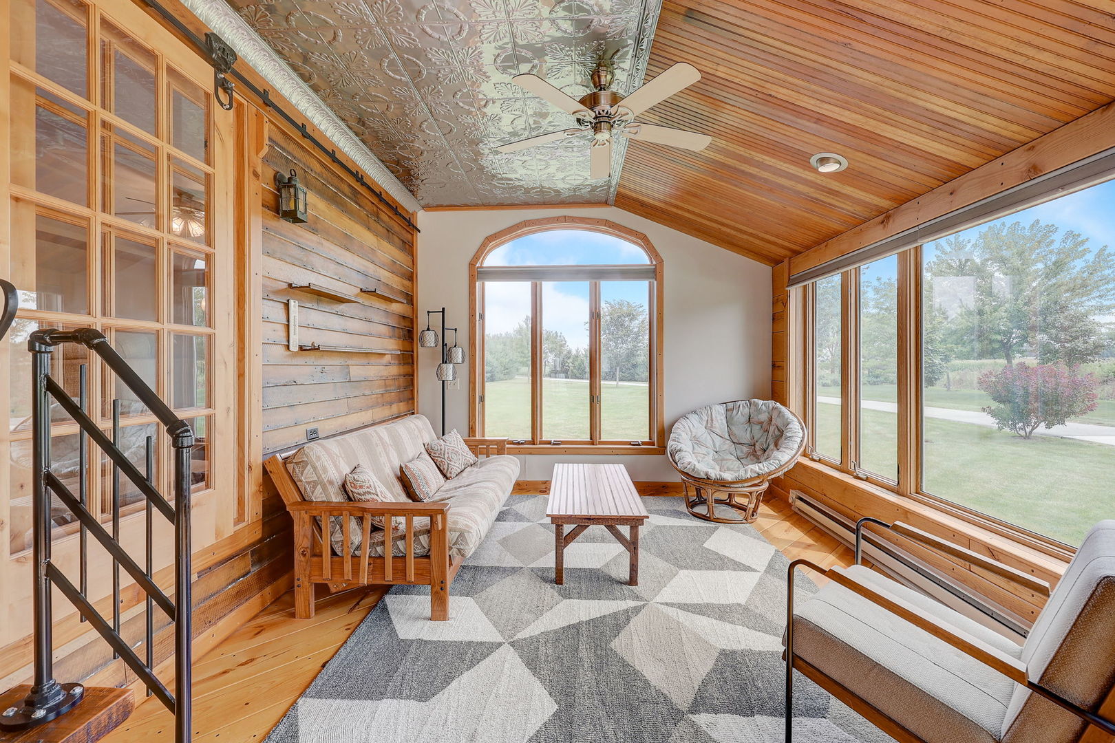 4234 East 12000th Road North Peotone, IL 60468 - Photo 21 of 62 a living room with furniture and floor to ceiling windows