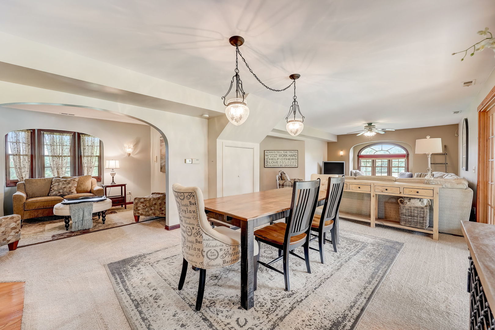 4234 East 12000th Road North Peotone, IL 60468 - Photo 30 of 62 a dining room with furniture a chandelier and wooden floor