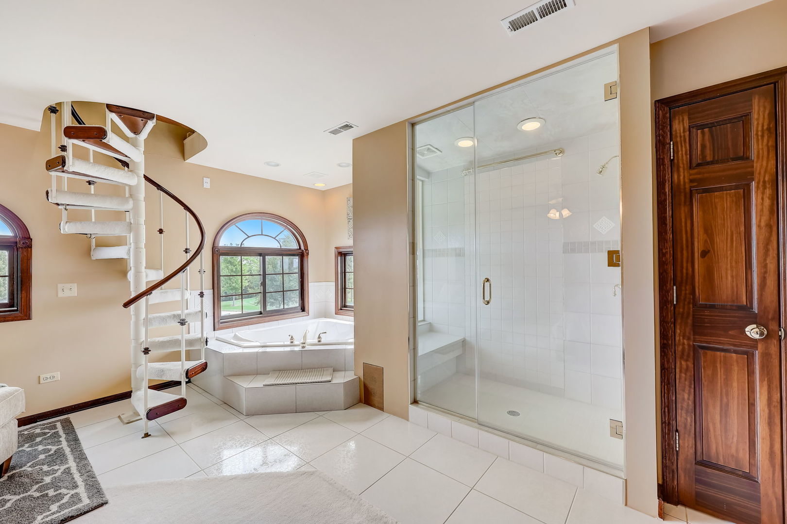 4234 East 12000th Road North Peotone, IL 60468 - Photo 35 of 62 a en suite spacious bathroom with a shower and a mirror