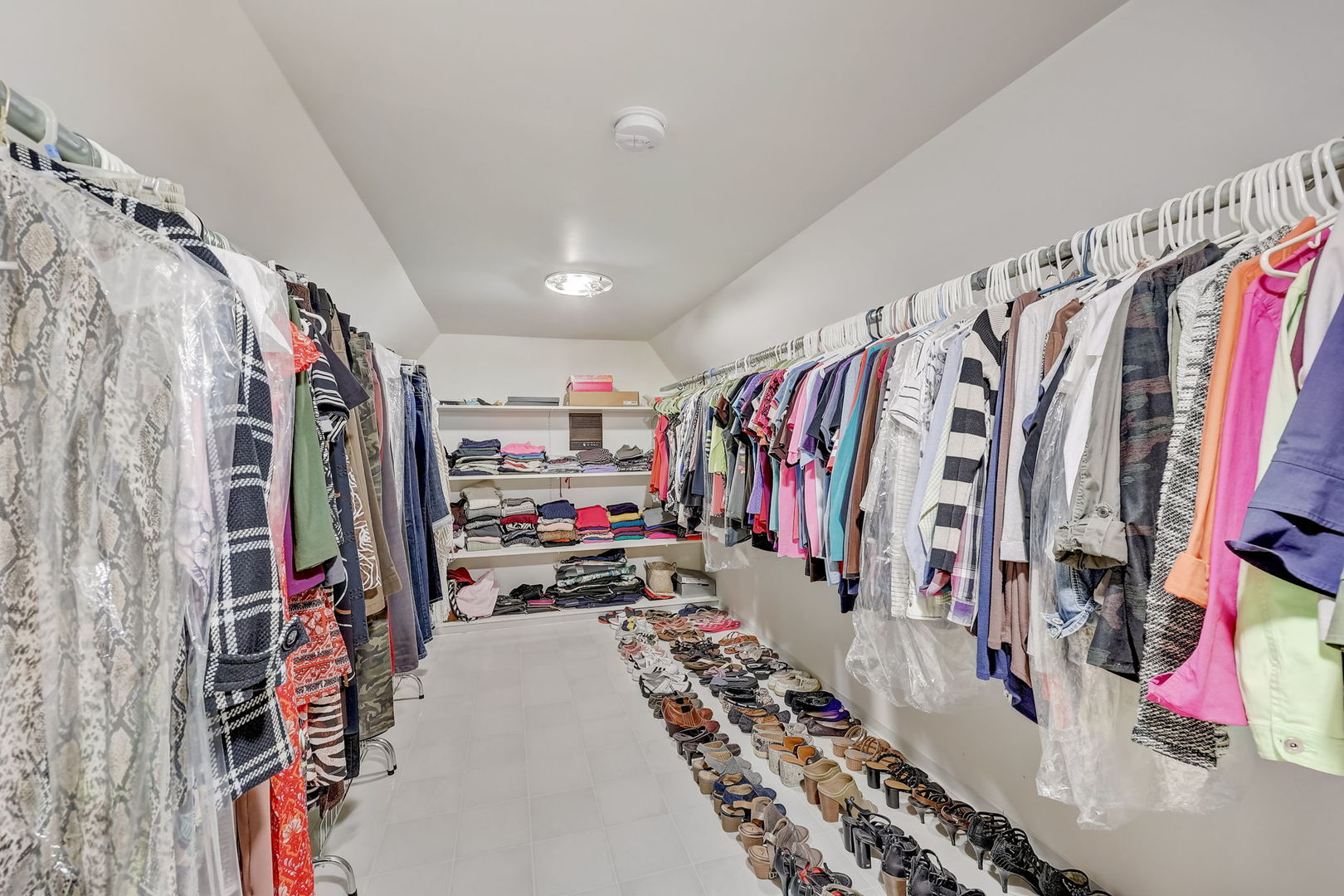 4234 East 12000th Road North Peotone, IL 60468 - Photo 37 of 62 a view of walk in closet with clothes