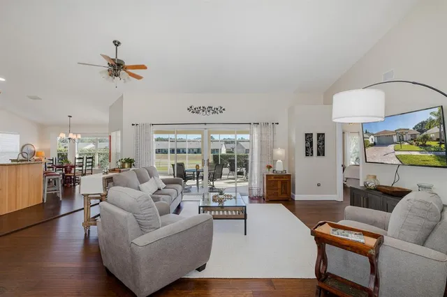 a kitchen with stainless steel appliances a sink stove and cabinets