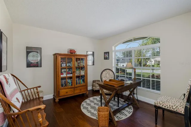 a view of a dining room with furniture window and outside view