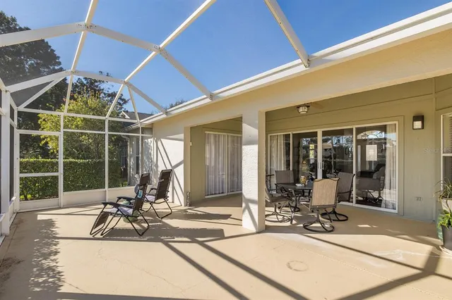 a view of a swimming pool with a lounge chair