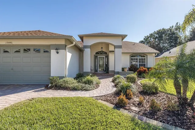 a view of a door and chair in the balcony