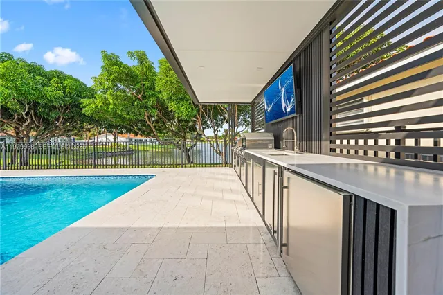 a front view of house with yard outdoor seating and barbeque oven