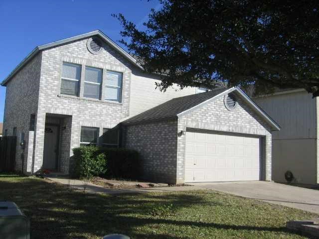 2418 Byfield Drive Cedar Park, TX 78613 - Photo 1 of 1 a front view of a house with a yard and garage