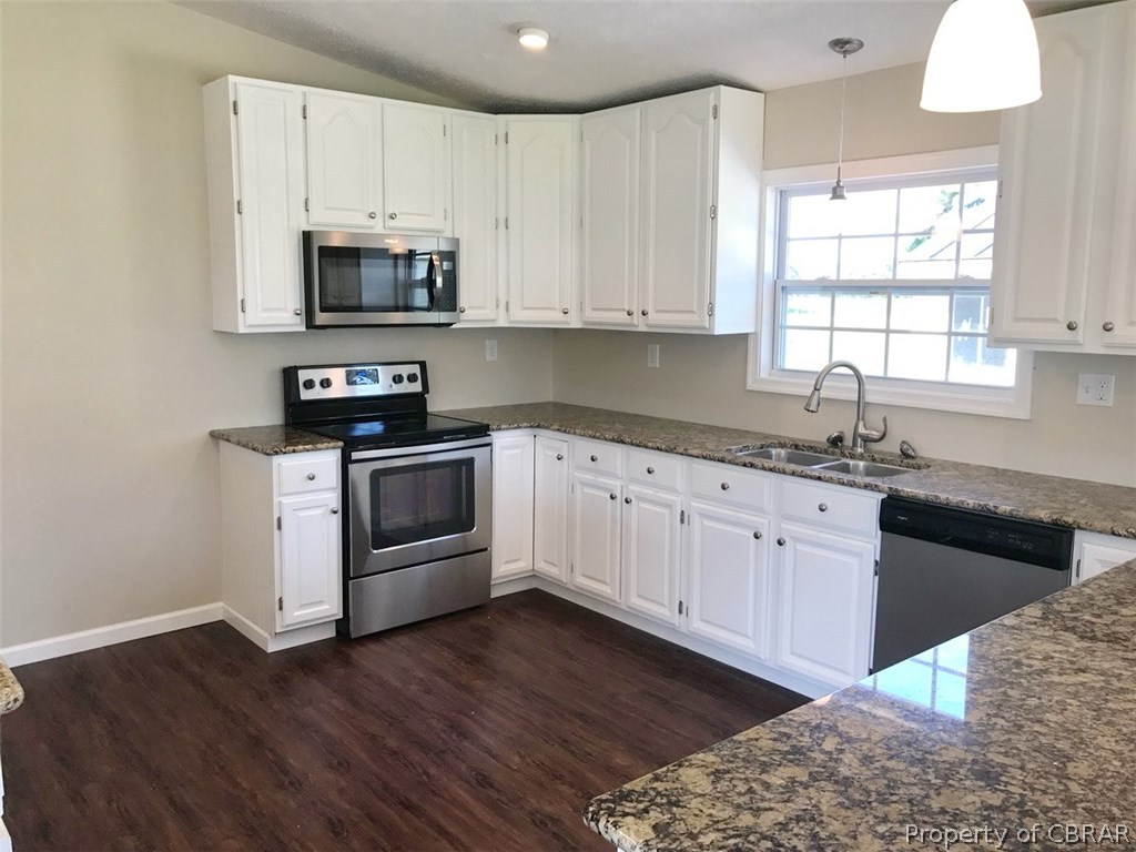 2181 Greys Point Road Topping, VA 23169 - Photo 16 of 20 Stainless steel appliances complete this great kitchen with recessed lighting.