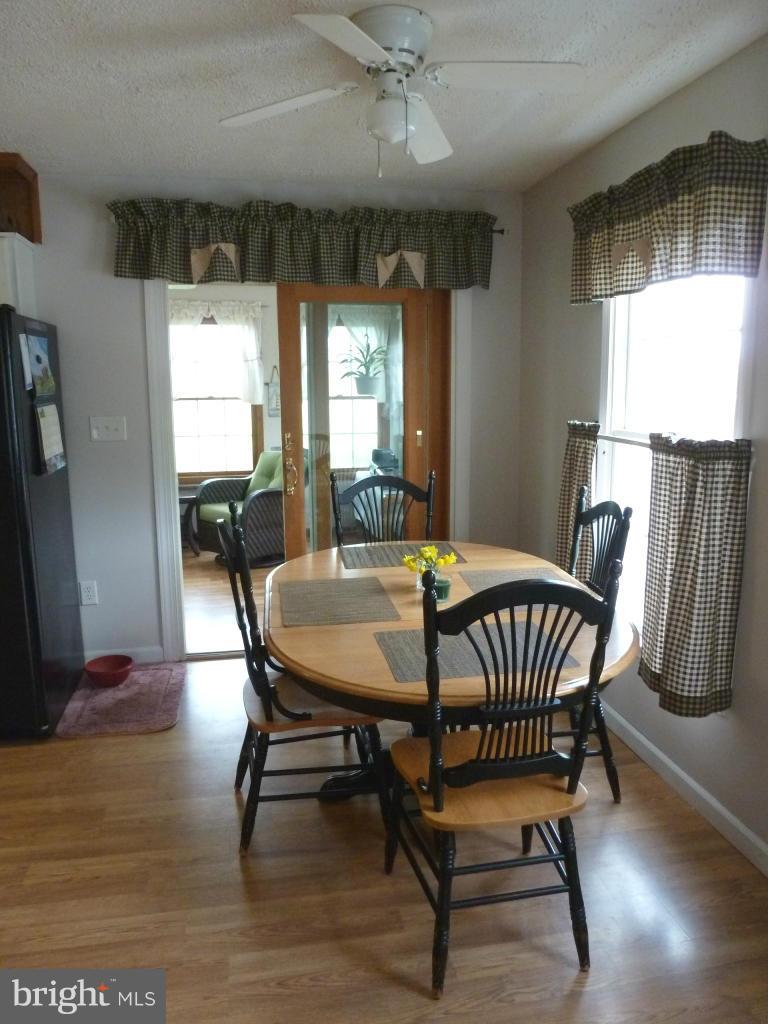 3580 Lander Road Jefferson, MD 21755 - Photo 16 of 30 View to glass sliders to enclosed sun porch!