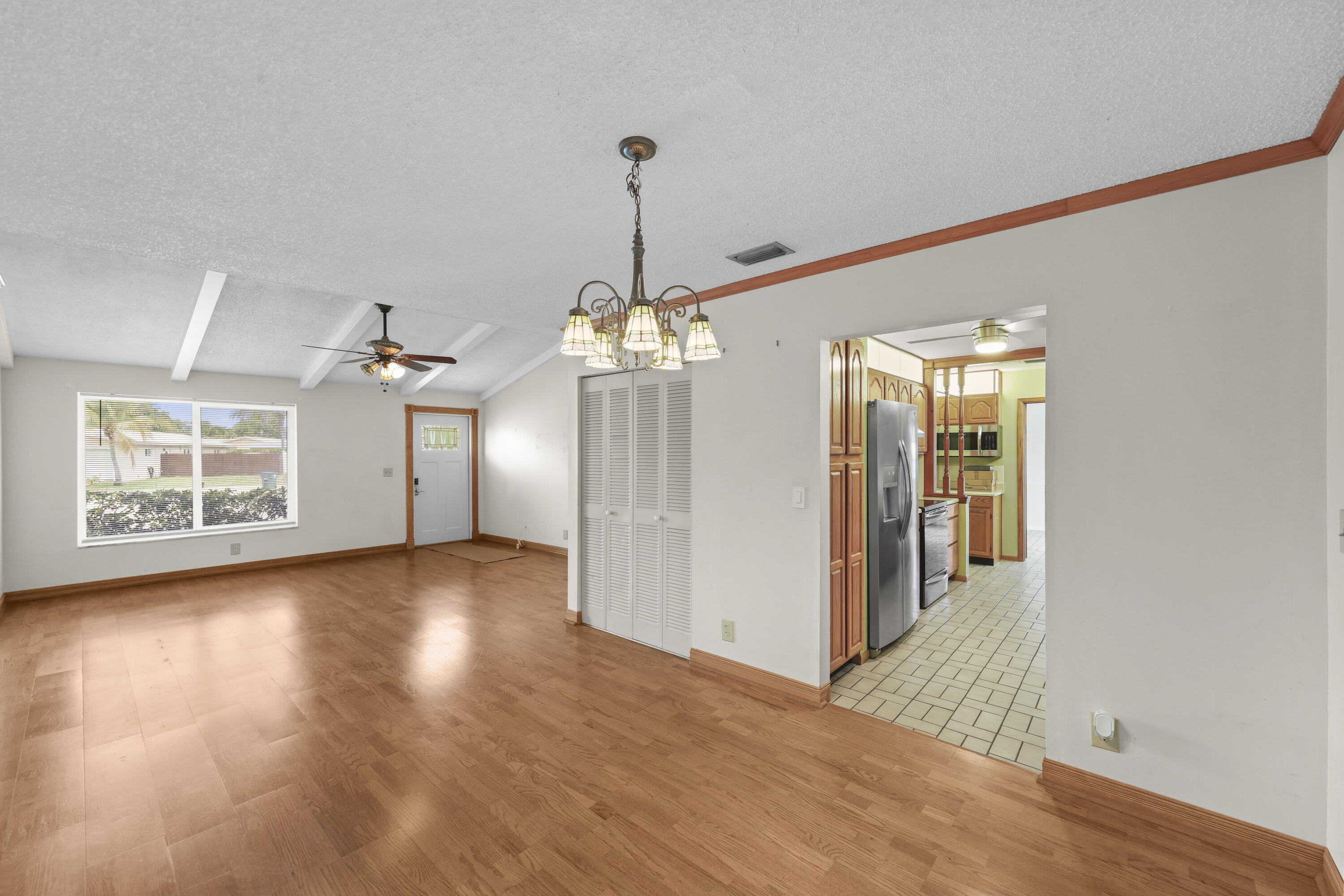 1720 Southwest 10th Street Boca Raton, FL 33486 - Photo 11 of 57 a view interior of a house wooden floor and windows