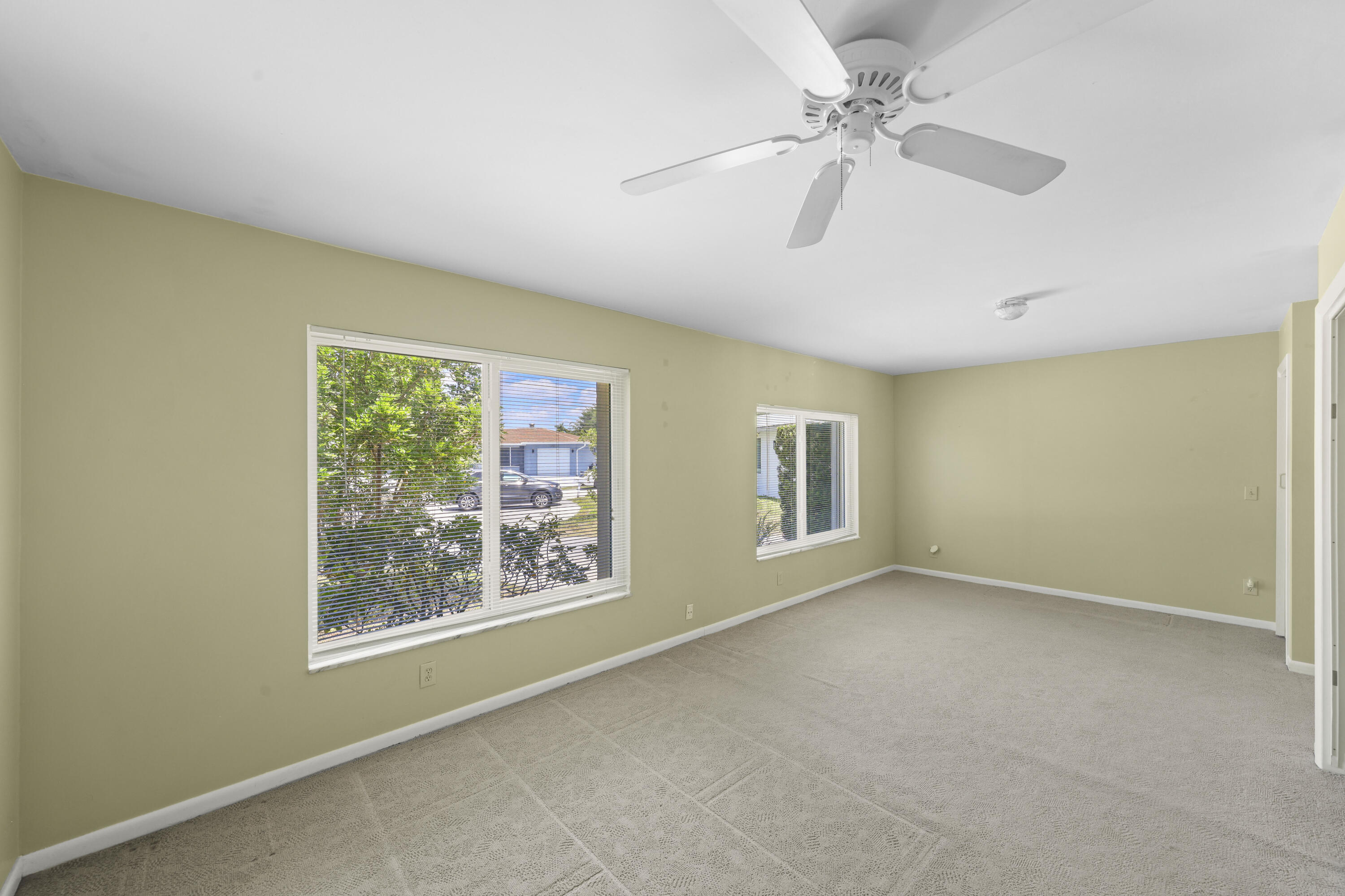 1720 Southwest 10th Street Boca Raton, FL 33486 - Photo 28 of 57 a view of an empty room with a window