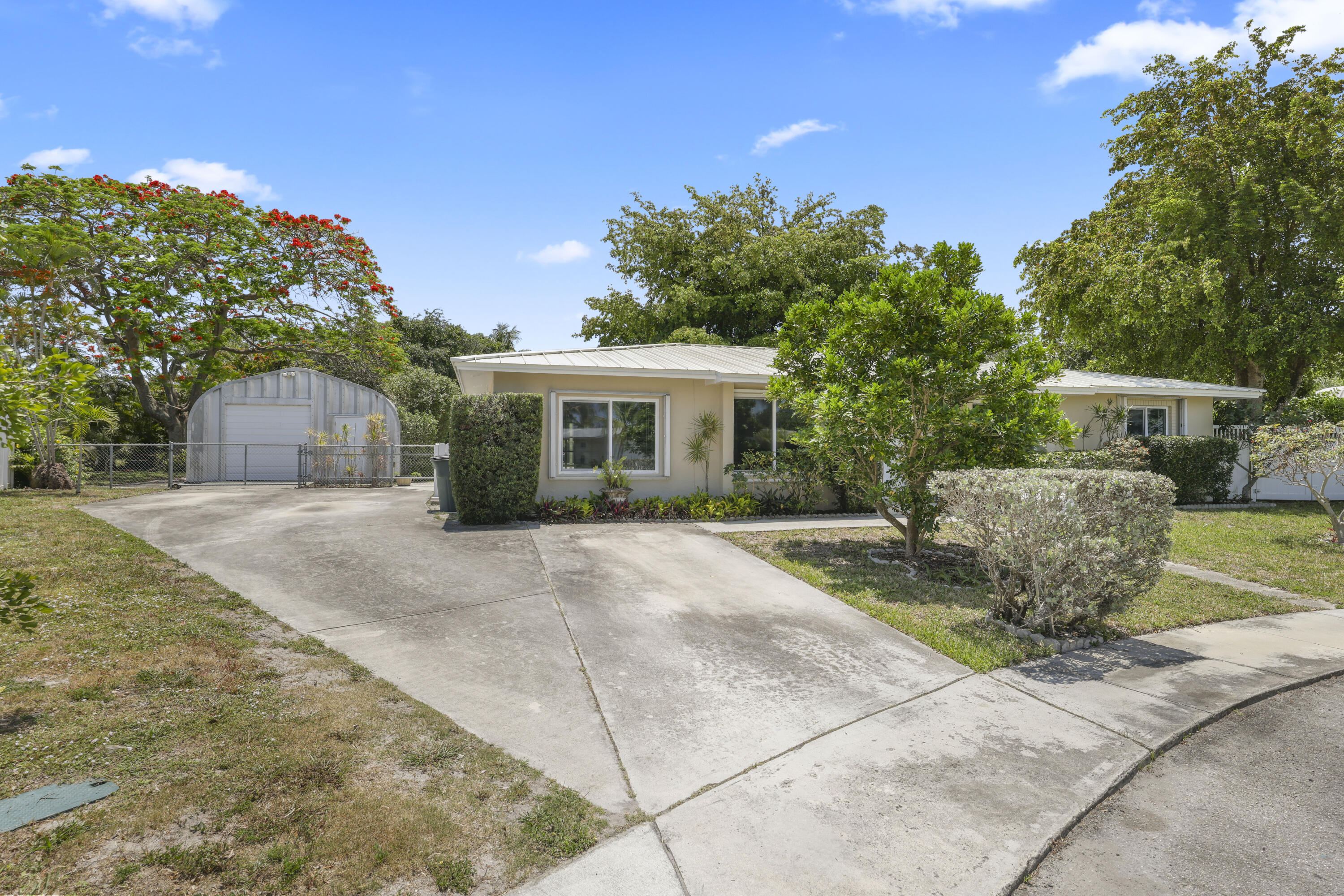 1720 Southwest 10th Street Boca Raton, FL 33486 - Photo 4 of 57 a view of house with outdoor space and street view