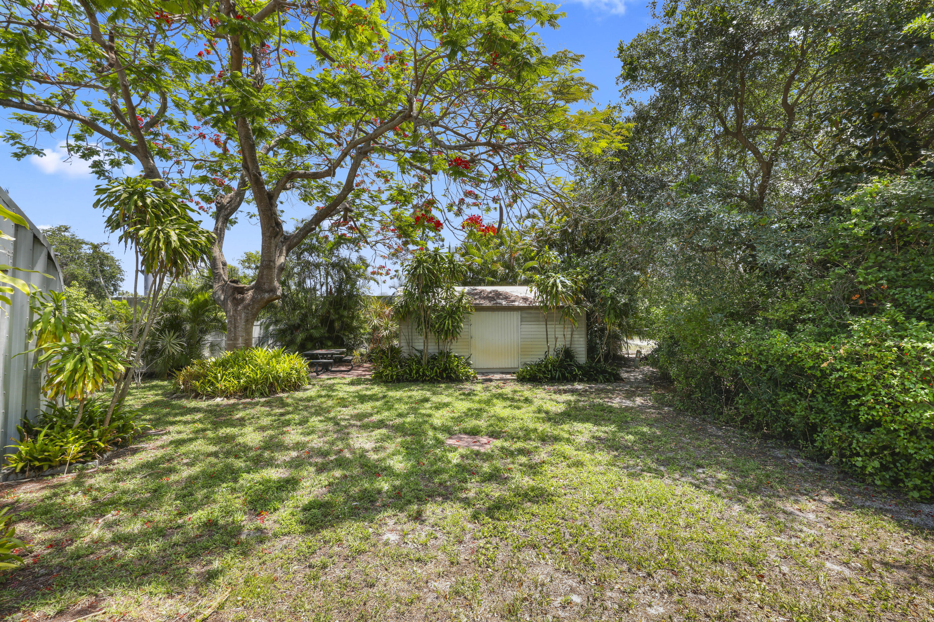 1720 Southwest 10th Street Boca Raton, FL 33486 - Photo 44 of 57 a fire hydrant in the middle of a field