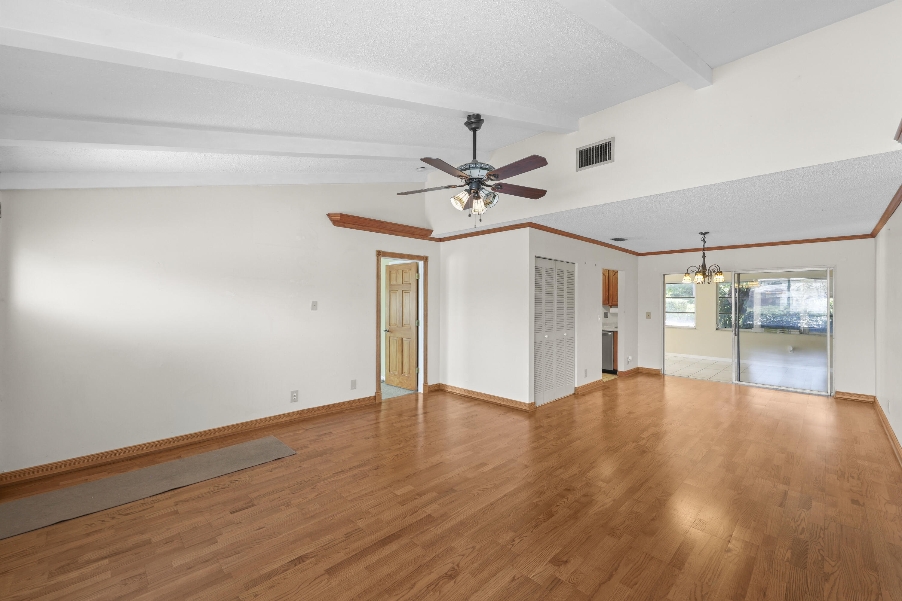1720 Southwest 10th Street Boca Raton, FL 33486 - Photo 8 of 57 a view of an empty room with a window