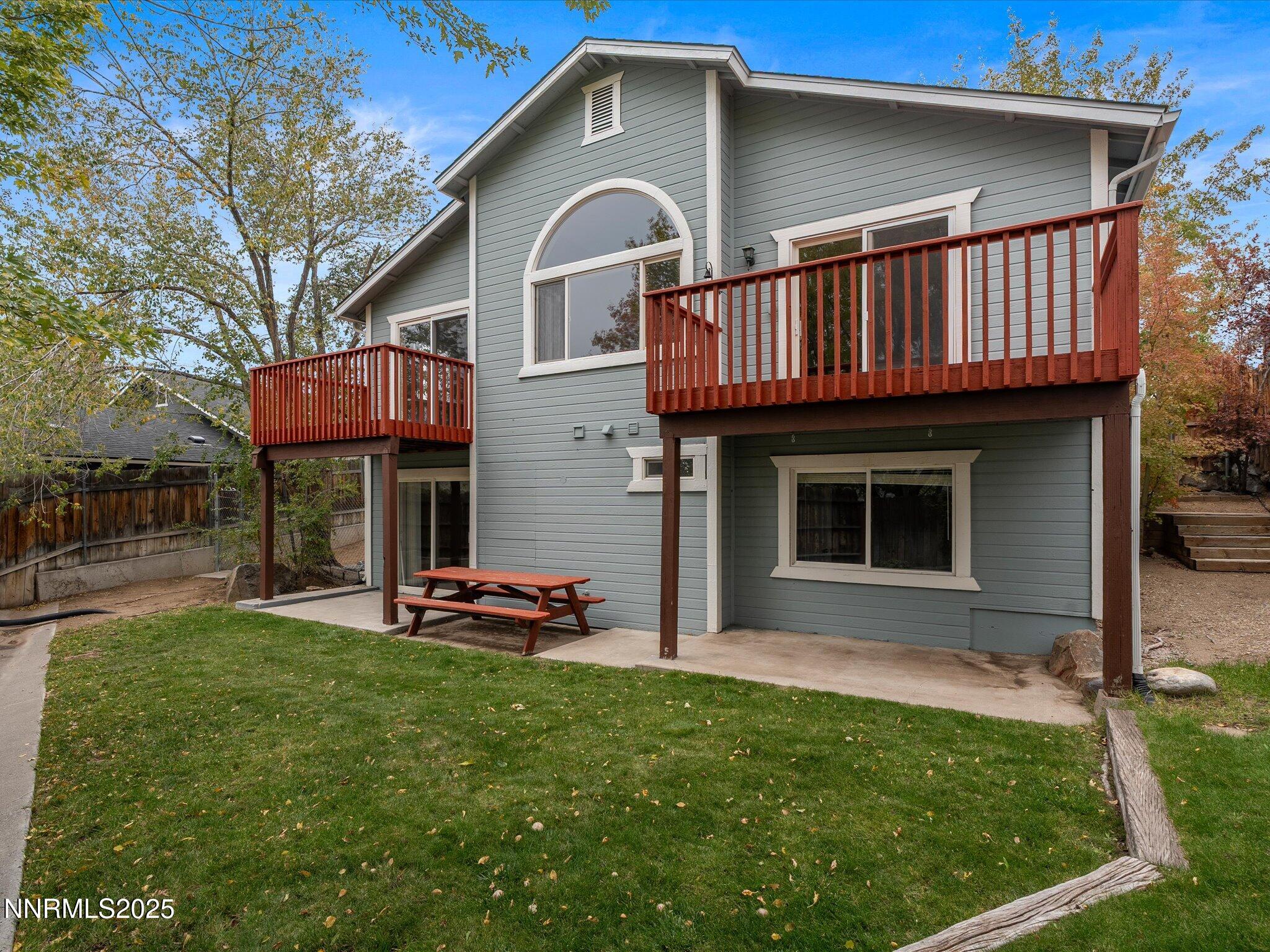 732 Talus Way Reno, NV 89503 - Photo 46 of 50 a front view of a house with a garden and plants