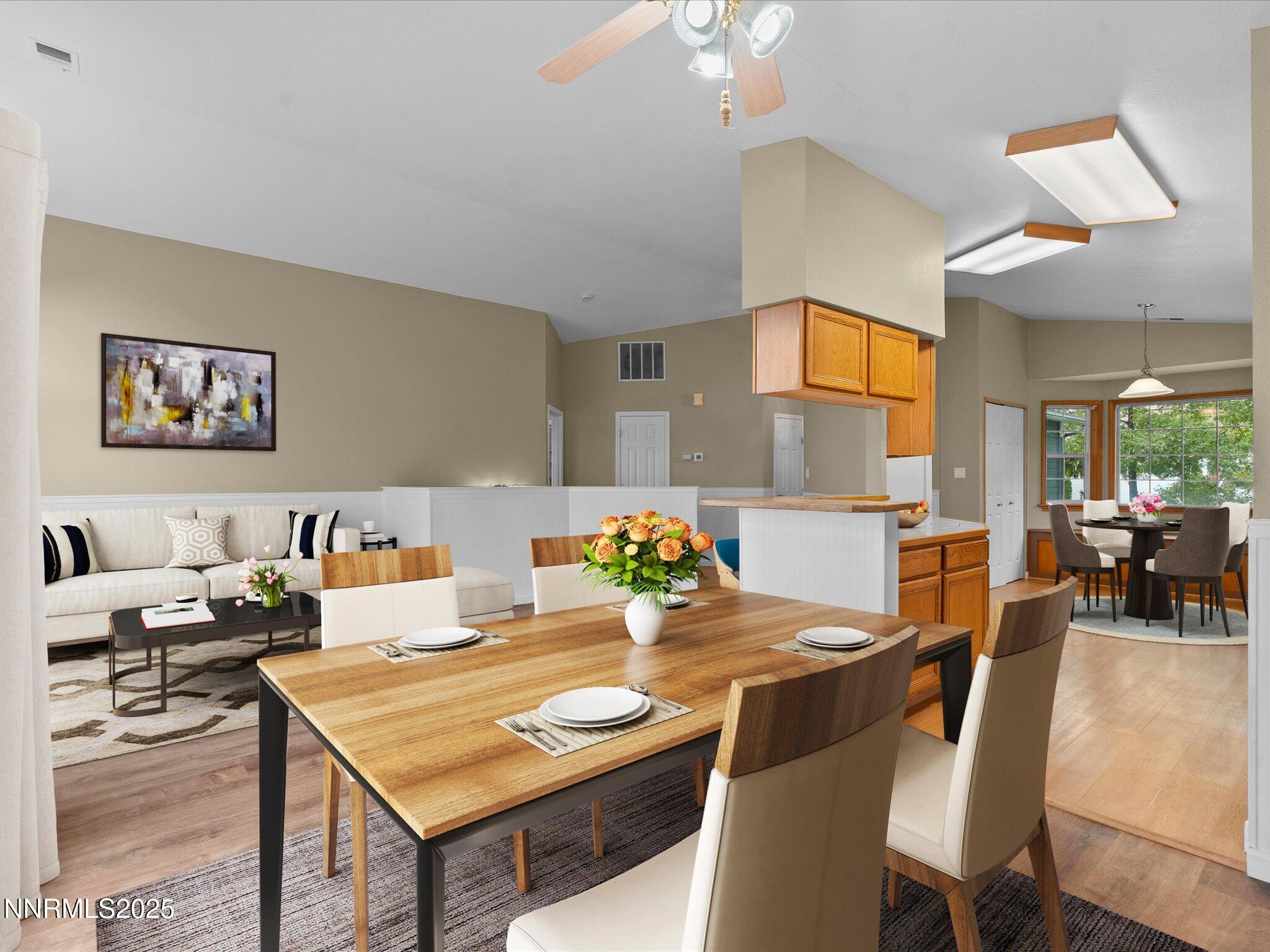732 Talus Way Reno, NV 89503 - Photo 8 of 50 a view of a dining room with furniture and a chandelier
