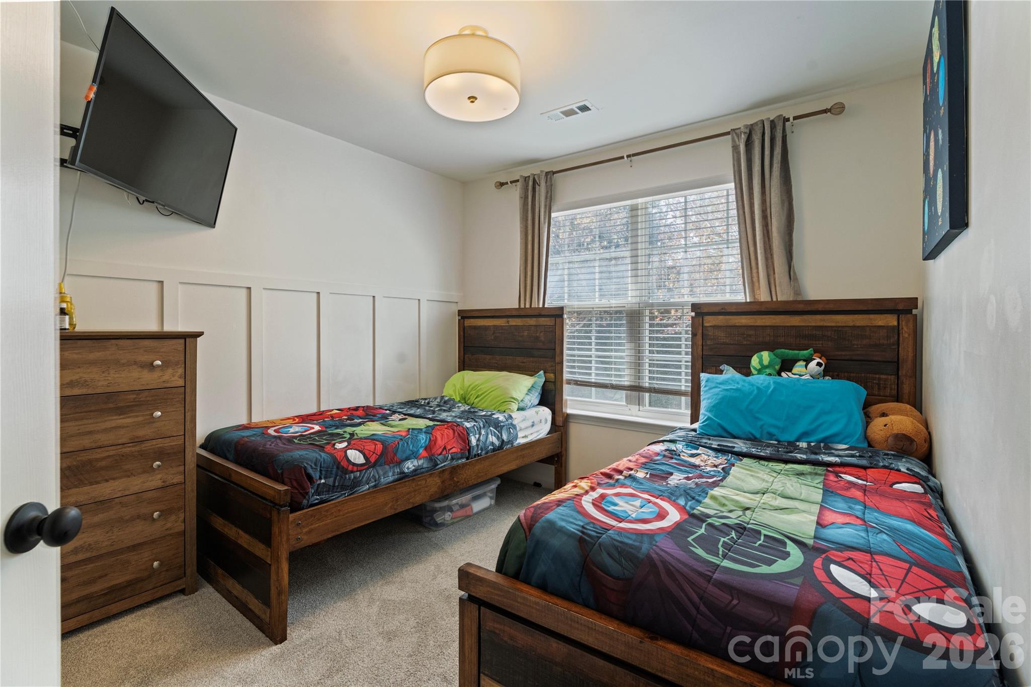 706 Shellstone Place Fort Mill, SC 29708 - Photo 22 of 23 a bedroom with two beds and a flat screen tv