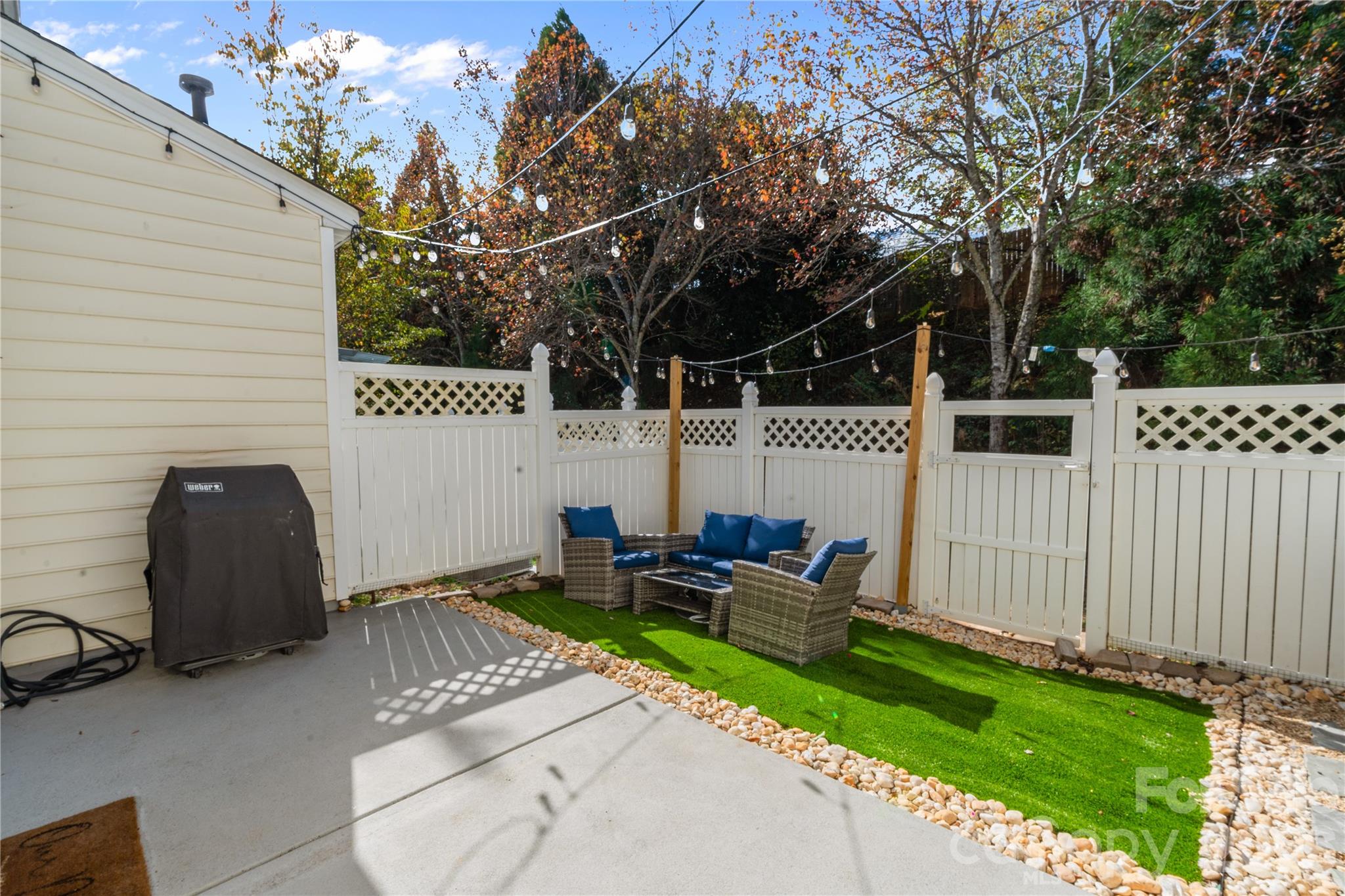 706 Shellstone Place Fort Mill, SC 29708 - Photo 23 of 23 a view of a patio with a table and chairs