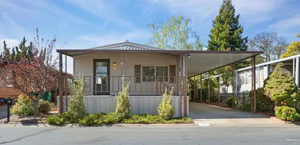front view of a house with a yard