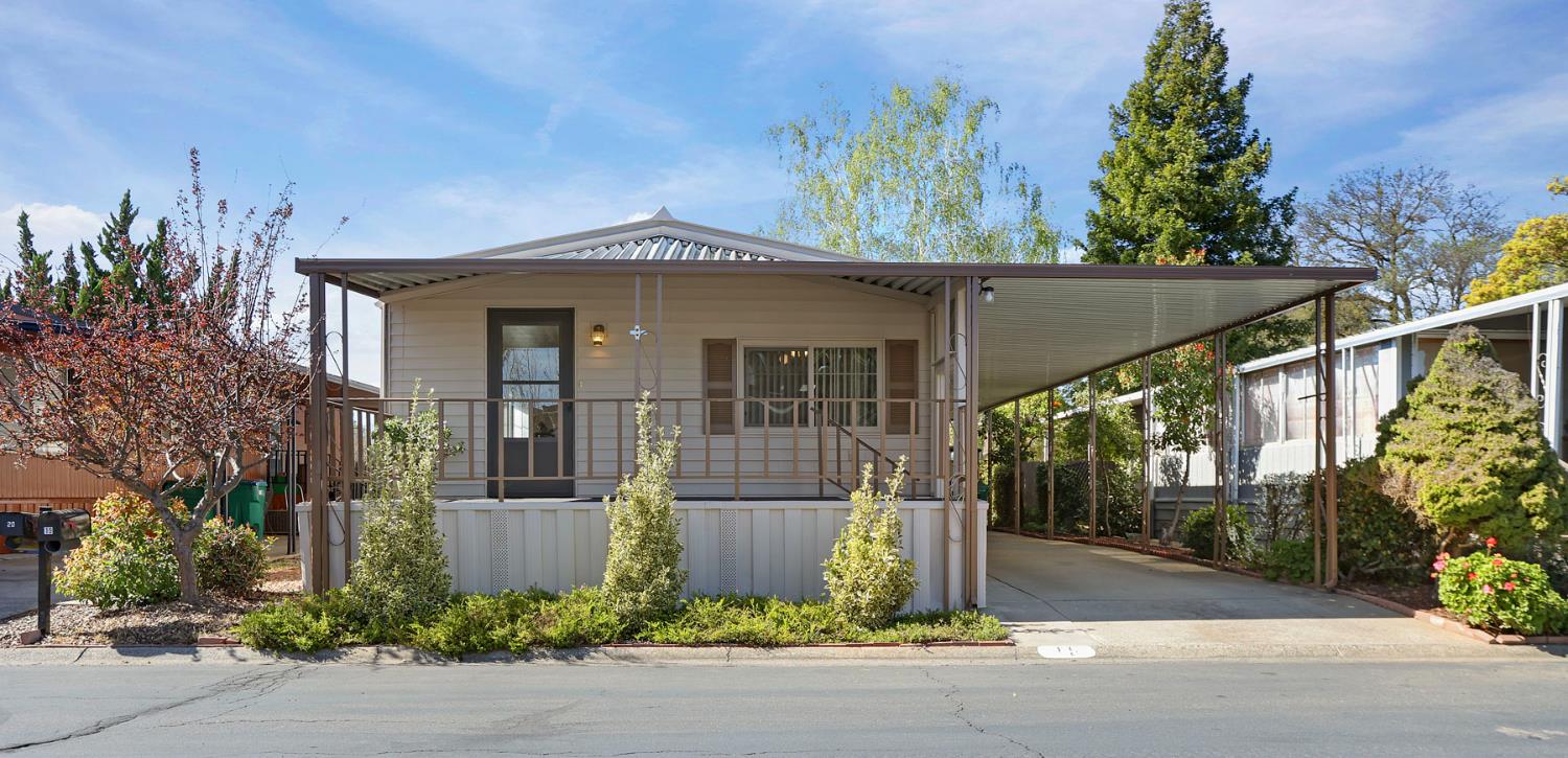 19 Rio Vista Drive Lodi, CA 95240 - Photo 1 of 34 front view of a house with a yard