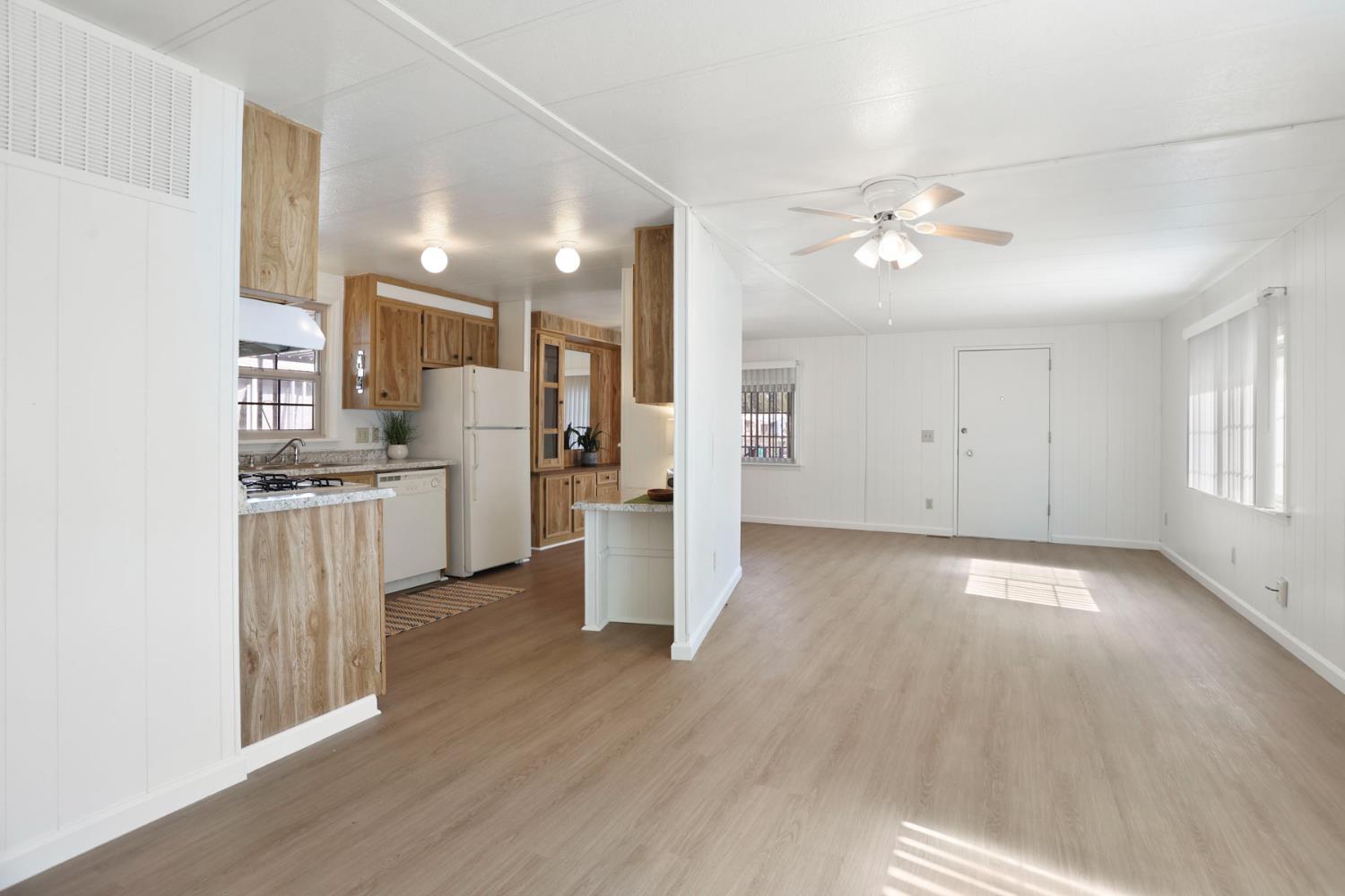 19 Rio Vista Drive Lodi, CA 95240 - Photo 14 of 34 a view of a kitchen with wooden floor and a kitchen