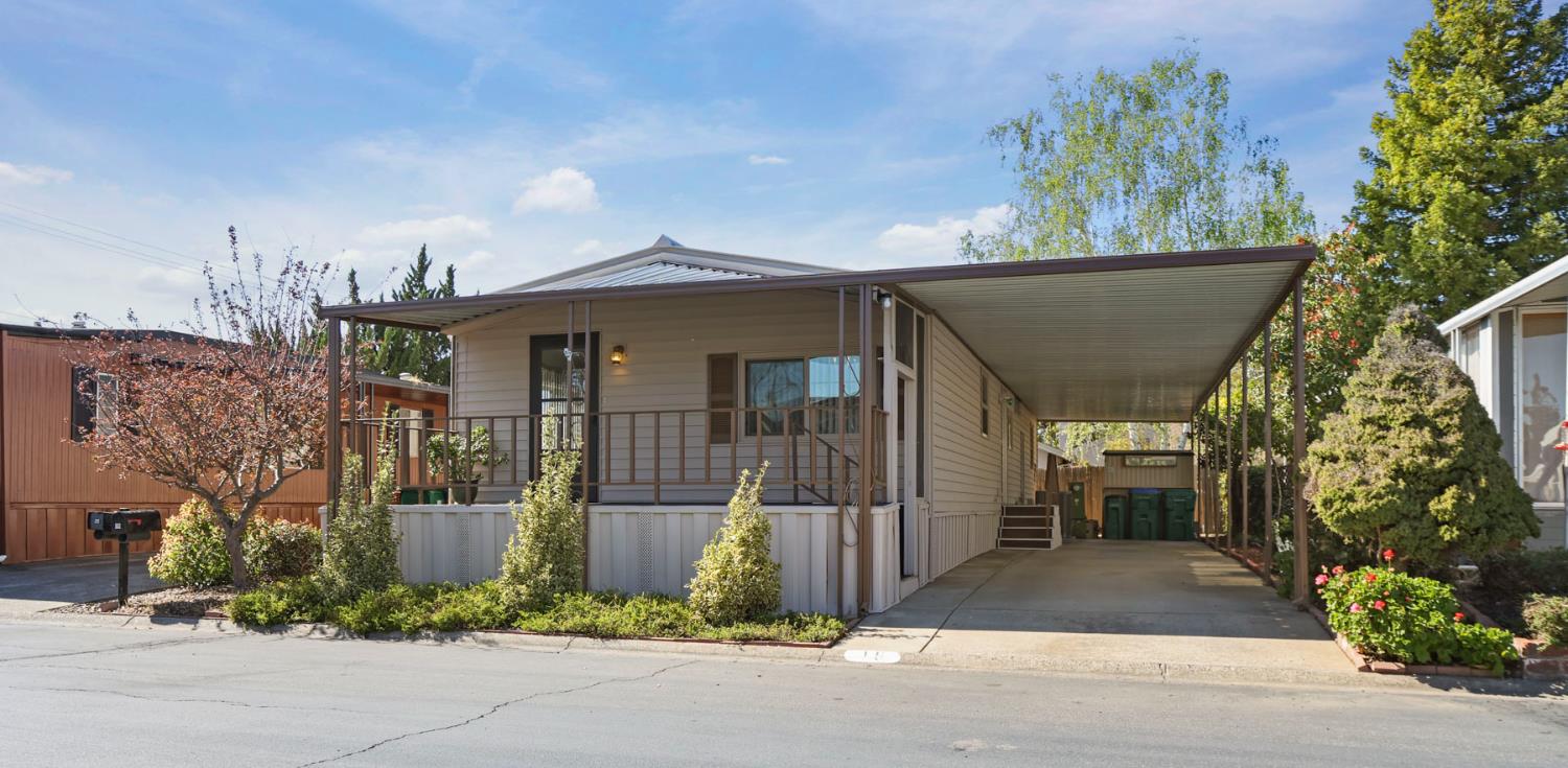 19 Rio Vista Drive Lodi, CA 95240 - Photo 3 of 34 a front view of a house with a yard