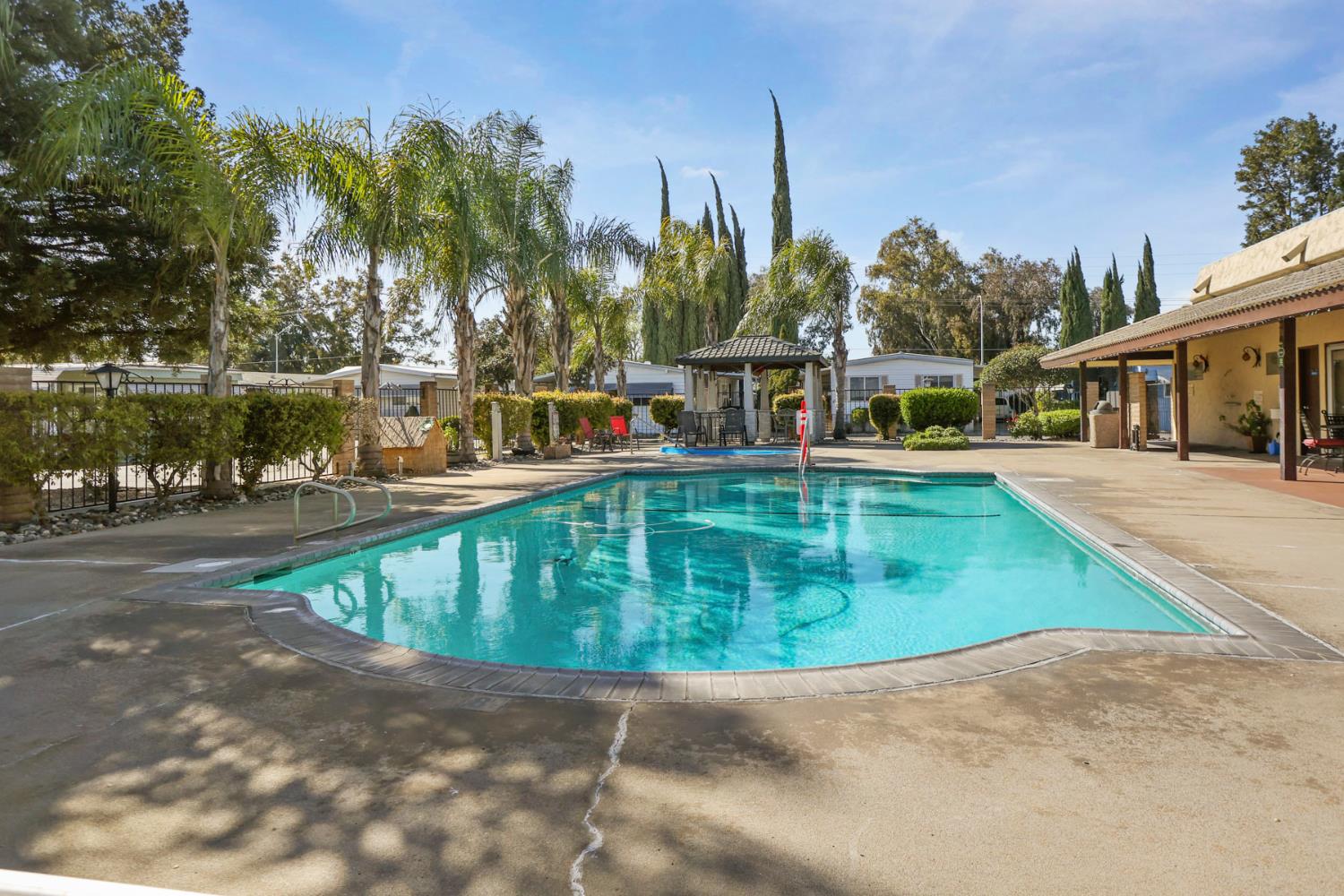 19 Rio Vista Drive Lodi, CA 95240 - Photo 33 of 34 a view of a swimming pool with a patio