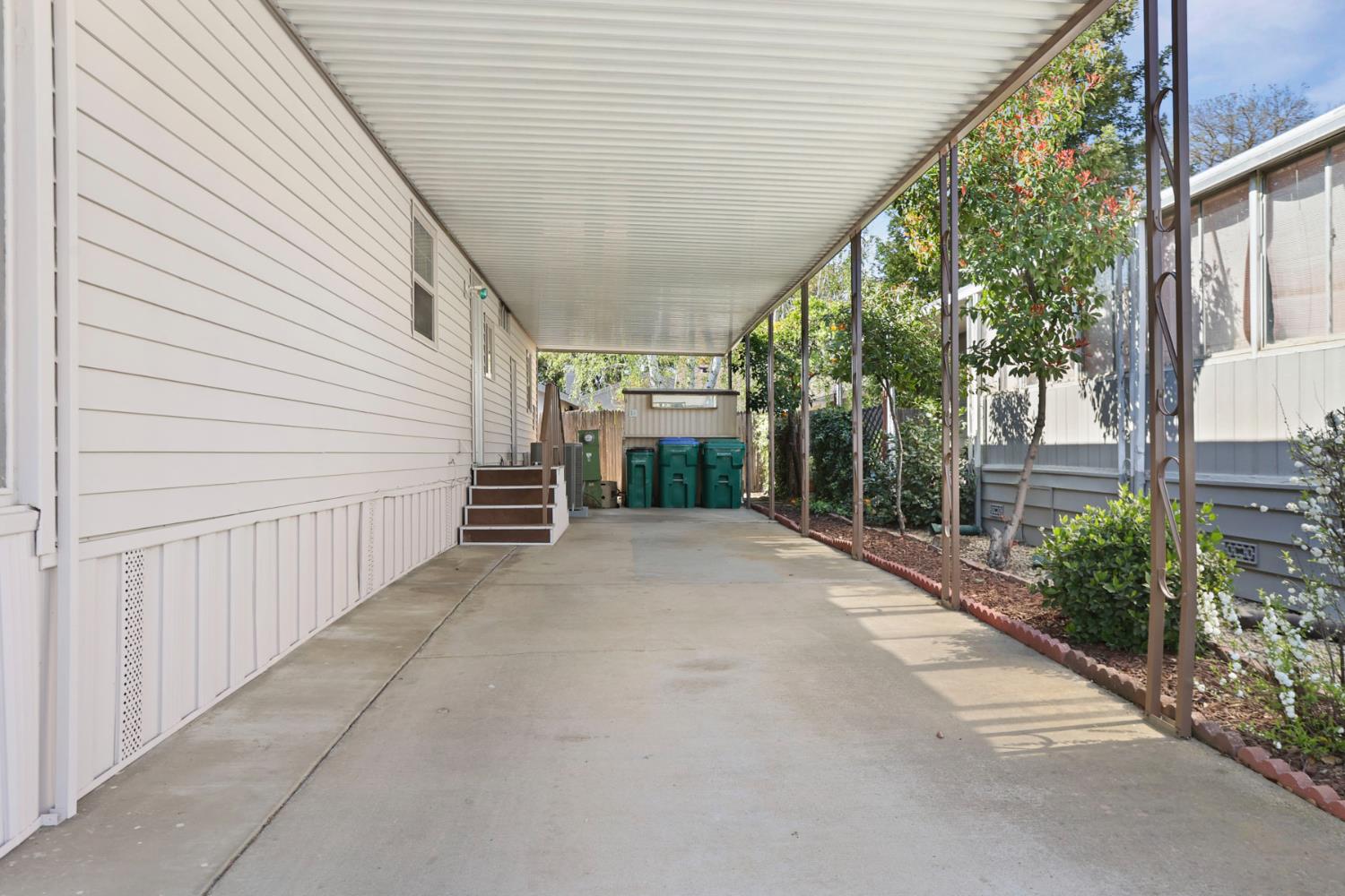 19 Rio Vista Drive Lodi, CA 95240 - Photo 5 of 34 a view of a porch with wooden floor and stairs
