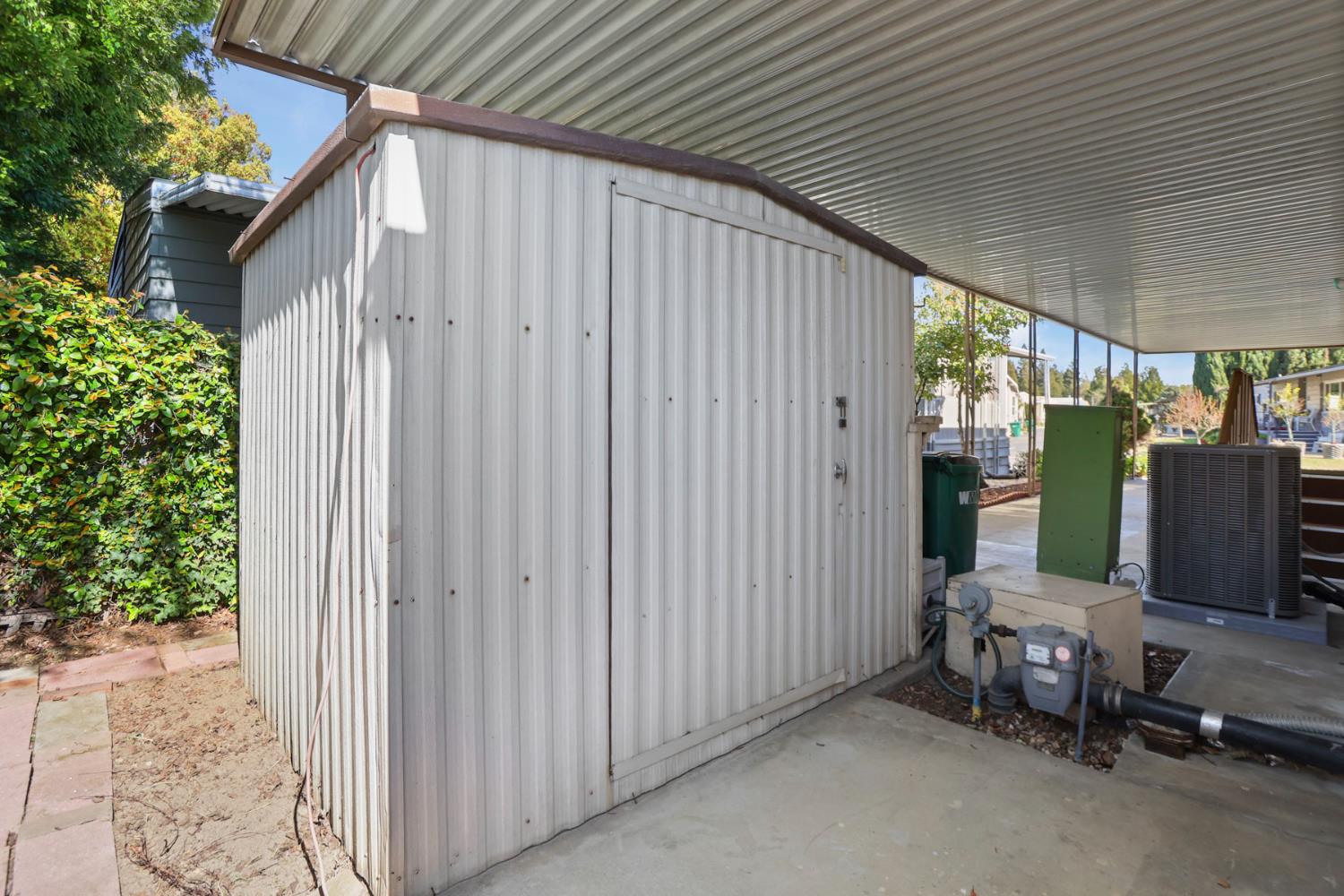 19 Rio Vista Drive Lodi, CA 95240 - Photo 7 of 34 a backyard of a house with table and chairs