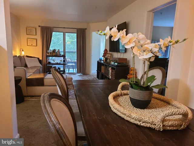a kitchen with stainless steel appliances a stove sink and cabinets