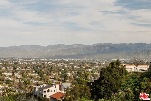 a view of lake and mountain