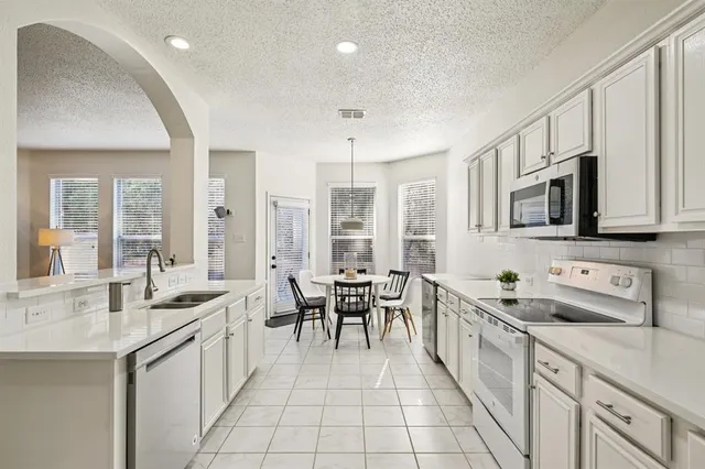 $410,000 | 5118 Royal Bay Drive, Rowlett, TX 75089